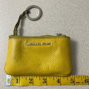 Free Michael kors key ring with your purchase of any of my listings .